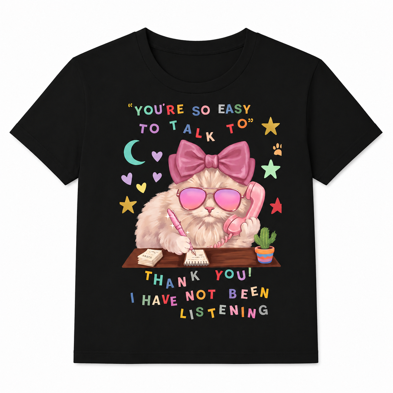 Black t-shirt with a cat graphic and humorous text on a white background