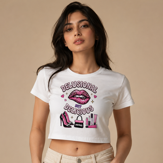 Woman wearing a white t-shirt with a graphic design on a beige background
