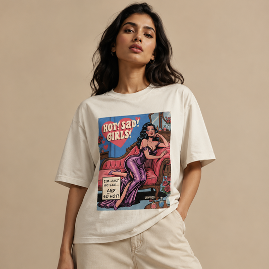 Woman wearing a t-shirt with a graphic design on a beige background